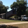Cottage Coming Off Truck